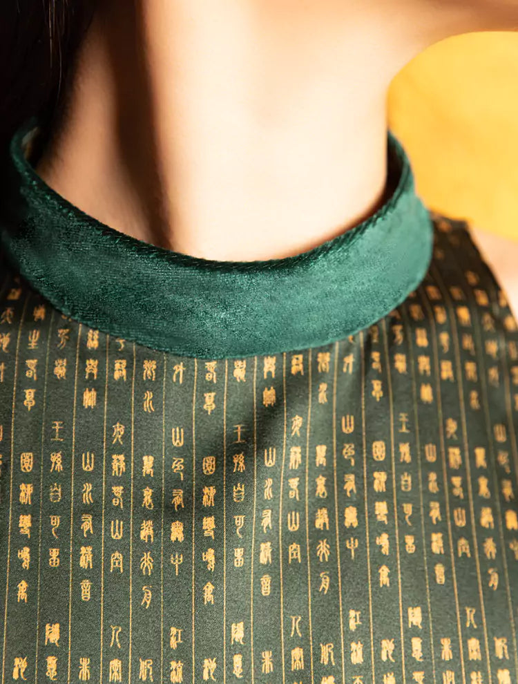 A close up of the Velvet Poem Top which features a custom print inspired by Chinese landscape poetry and a velvet collar. She exudes grace in this Modern Chinese chic style.